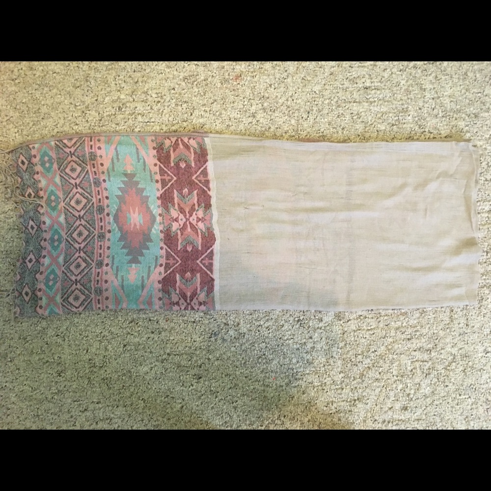 Beige, pink, and blue pattern scarf.